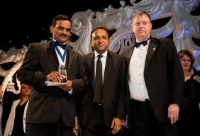 Winner of the SACC competition with sponsor Bioren Parikh and judge Andrew Green