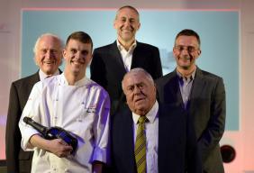 Image of 2014 Roux scholar Tom Barnes and the Roux family