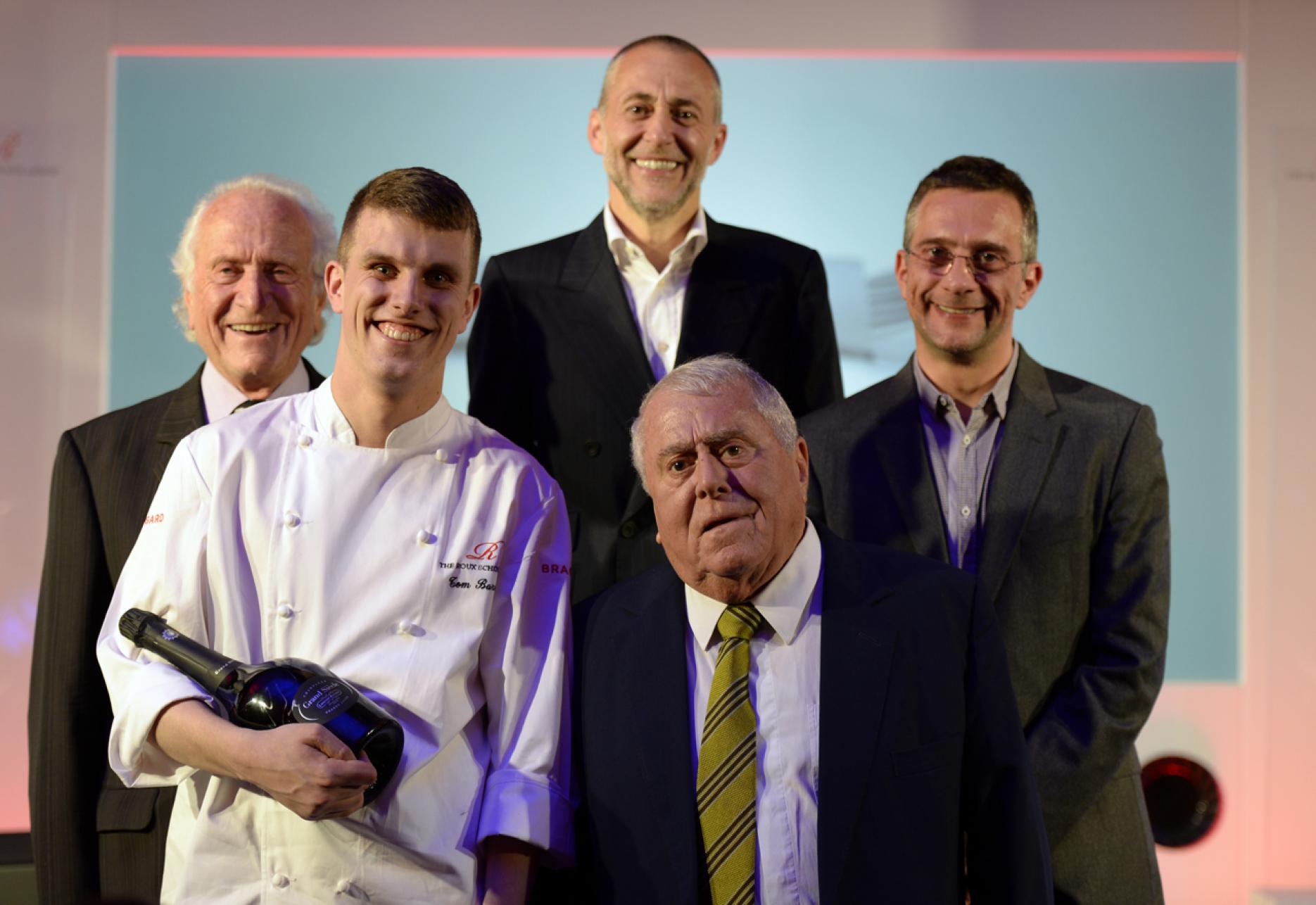 Image of 2014 Roux scholar Tom Barnes and the Roux family