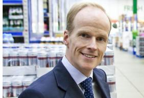 Tesco Booker merger Charles Wilson chief executive