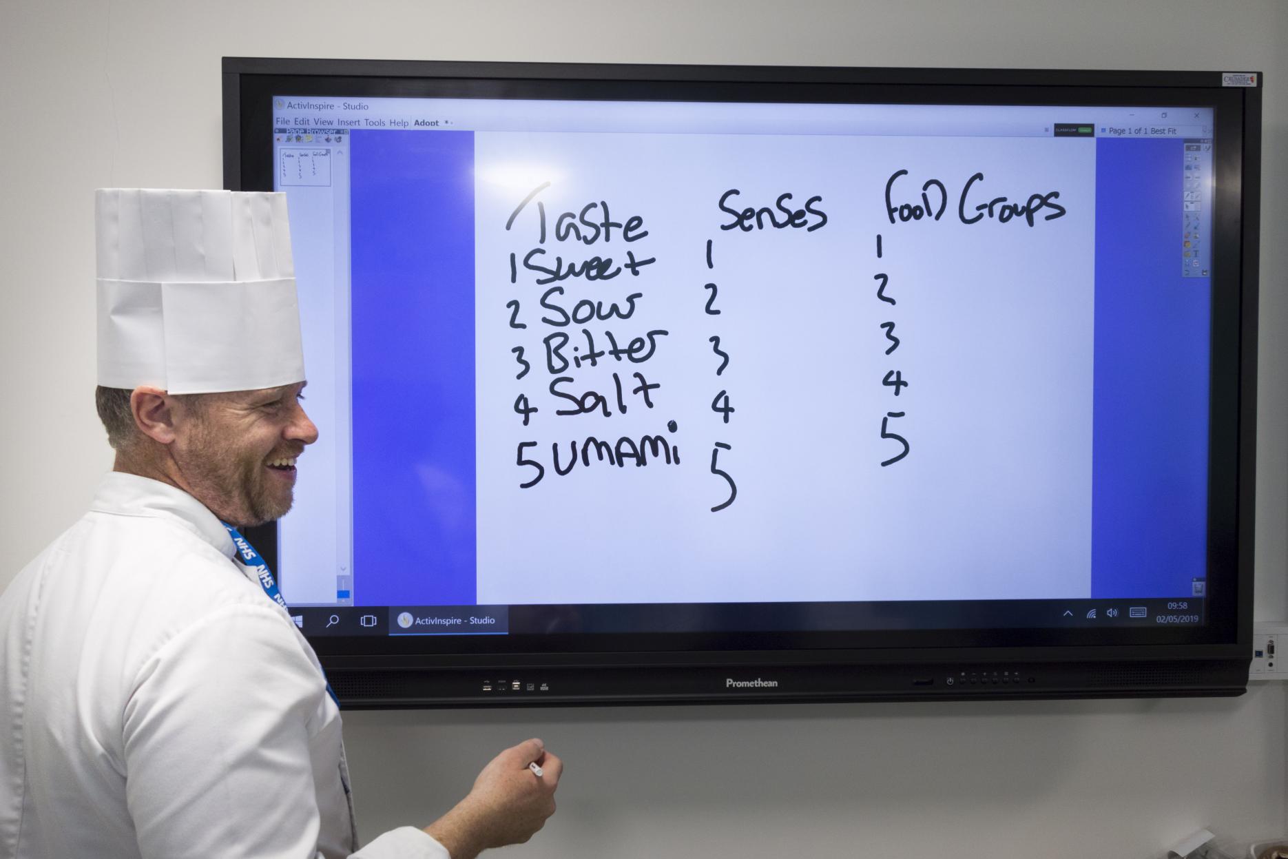 Ashley Marsh teaching students about practical cookery through the Adopt a School Programme Chef delivers food education sessions to young people at London hospital