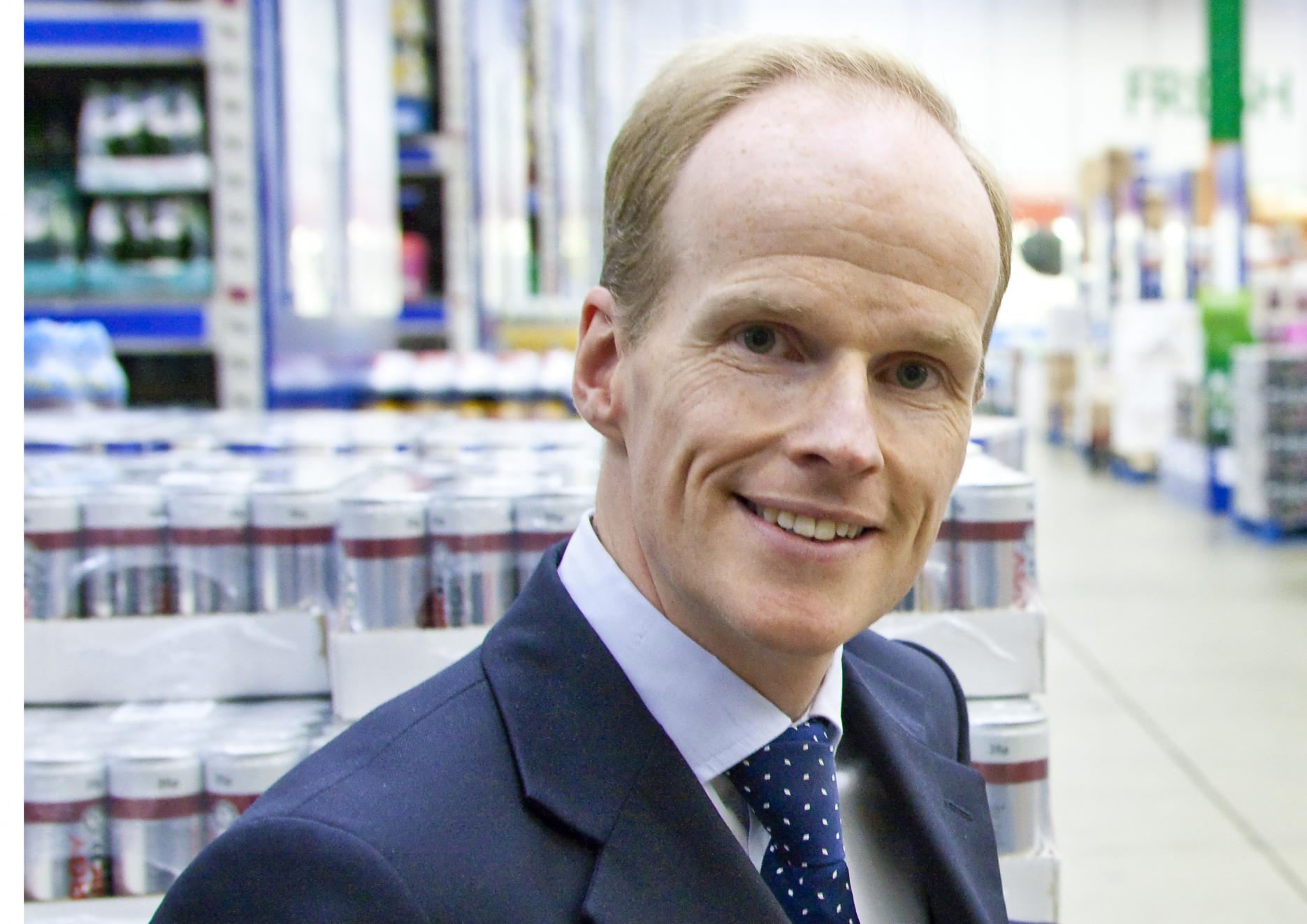 Booker chief executive Charles Wilson Tesco Booker merger Charles Wilson chief executive