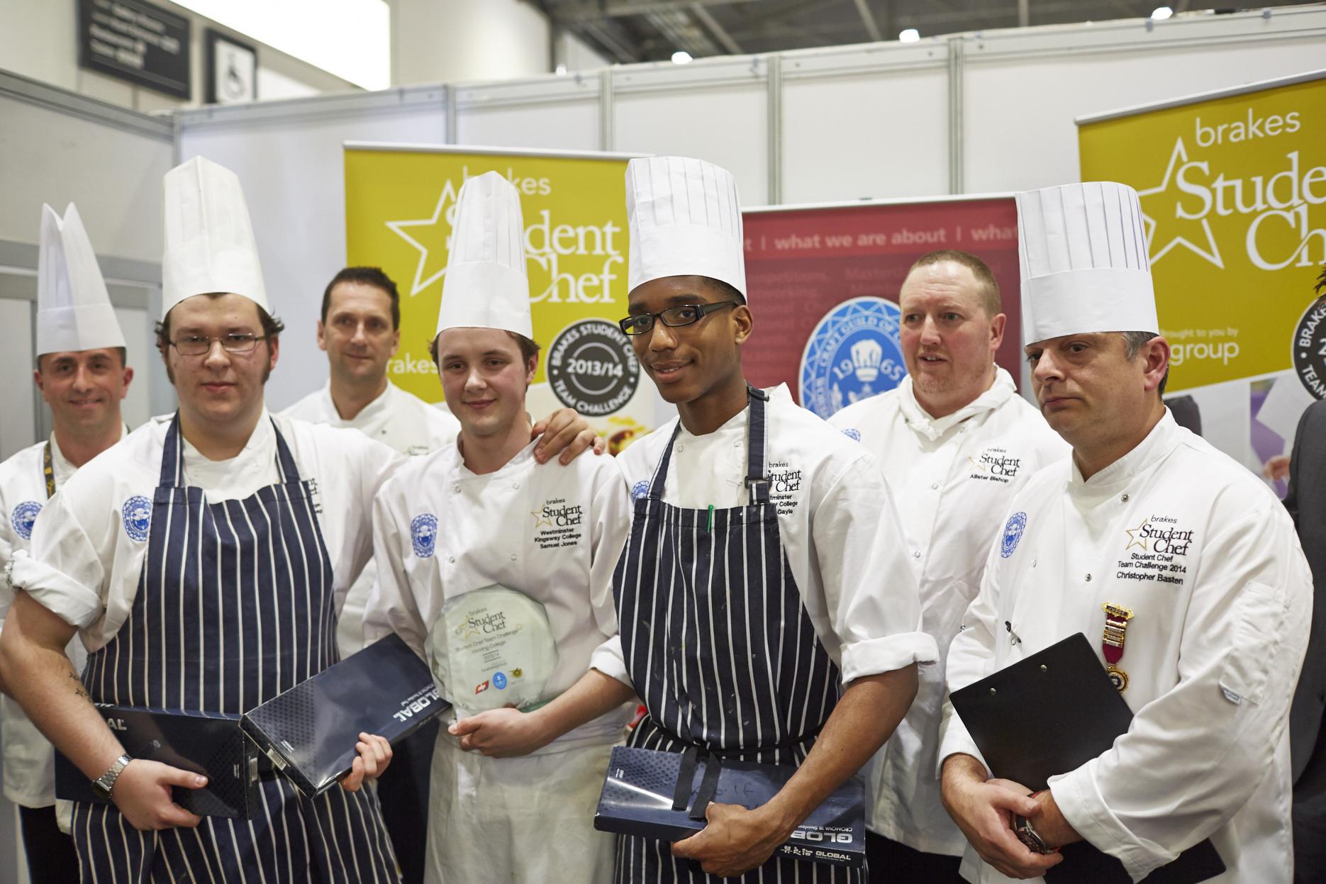 Westminster Kingsway College's winning team and judges