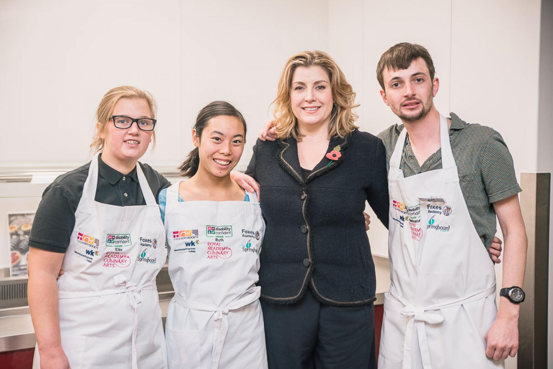 Penny Mordaunt with the food service team