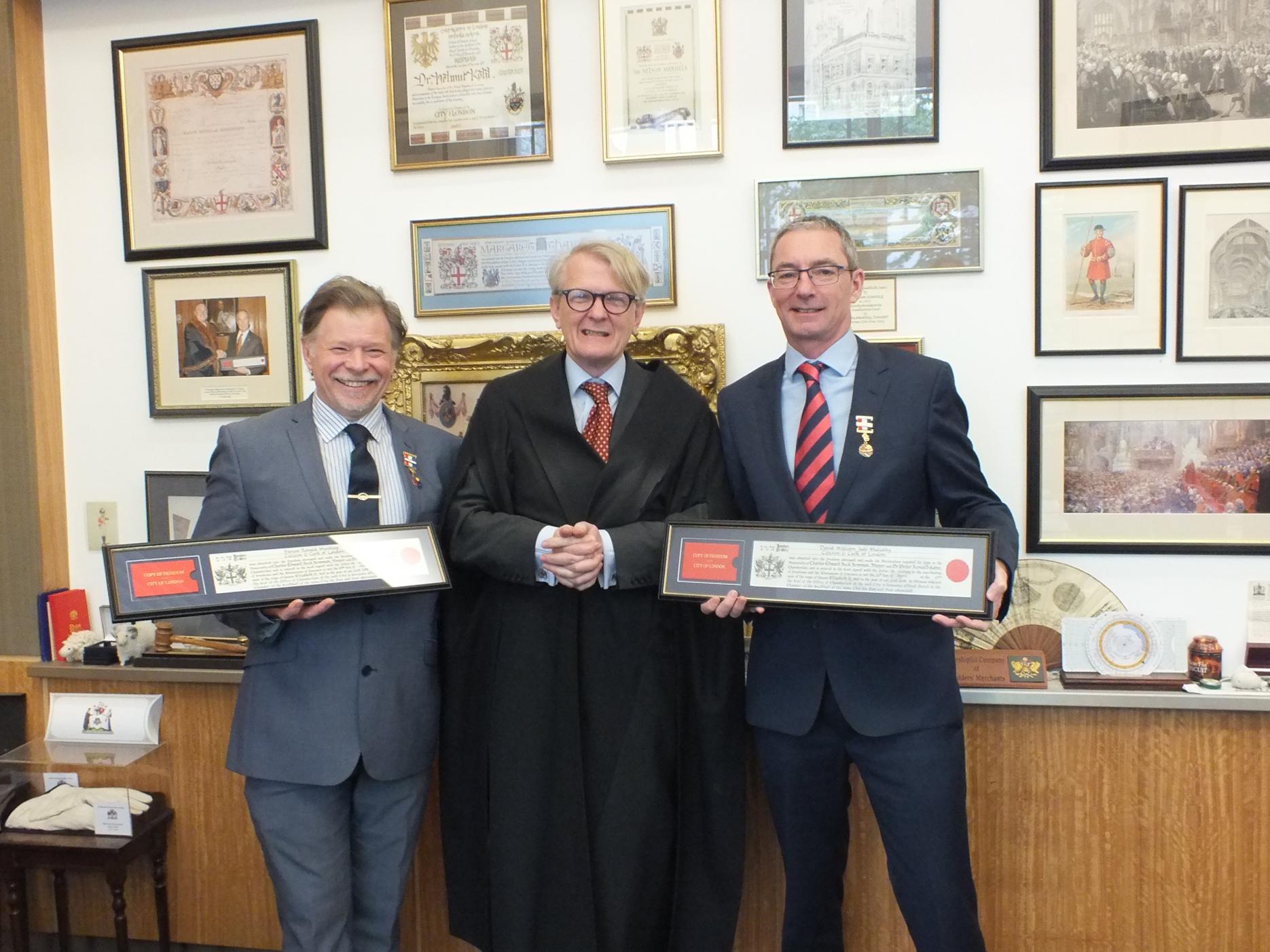 (L-R) Steve Munkley, the Clerk of the Court and David Mulcahy